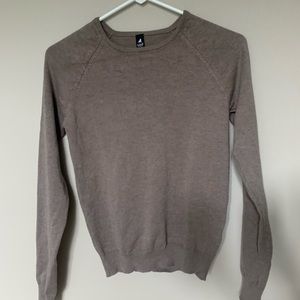 tan form fitting sweater